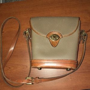 Dooney and Burke crossbody bag in brown grey.